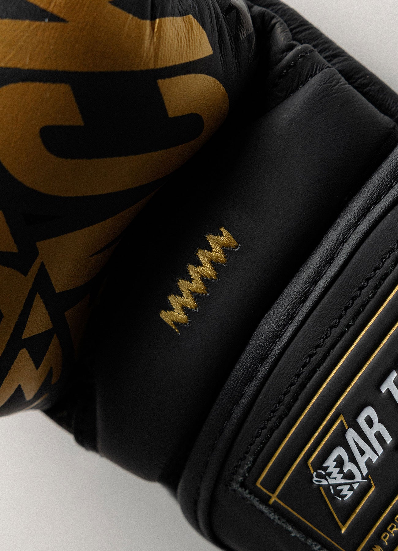 Nova™ "Gravity" Bar Tack MMA Sparring Gloves - Black/Gold