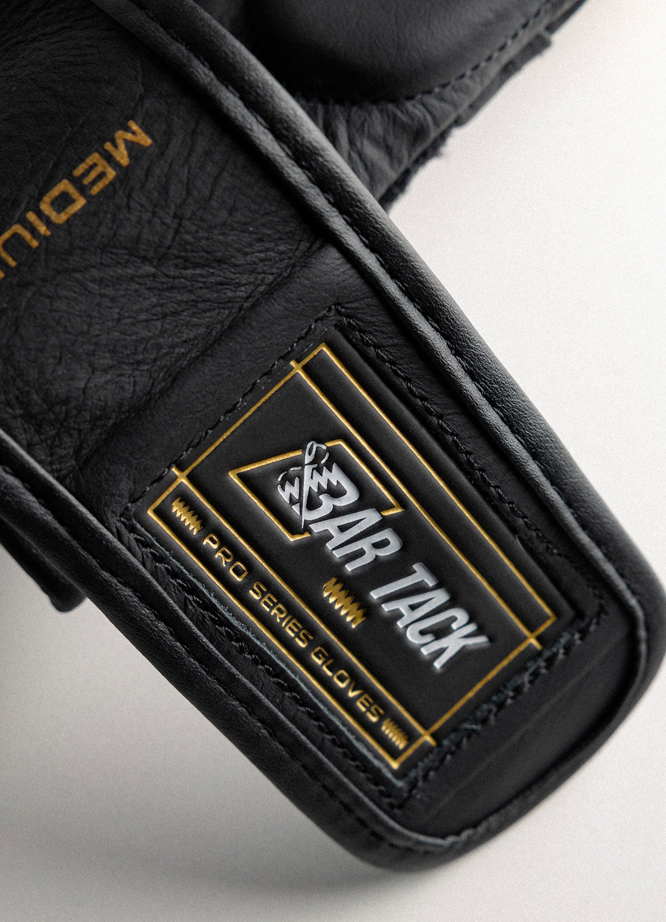 Nova™ "Gravity" Bar Tack MMA Sparring Gloves - Black/Gold